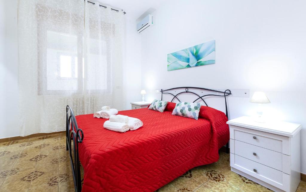 Postel nebo postele na pokoji v ubytování Lupomonaco Rooms