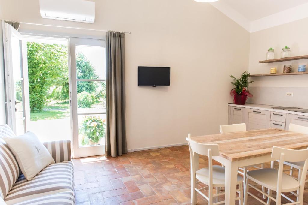 TV a/nebo společenská místnost v ubytování Agriturismo Poderedodici