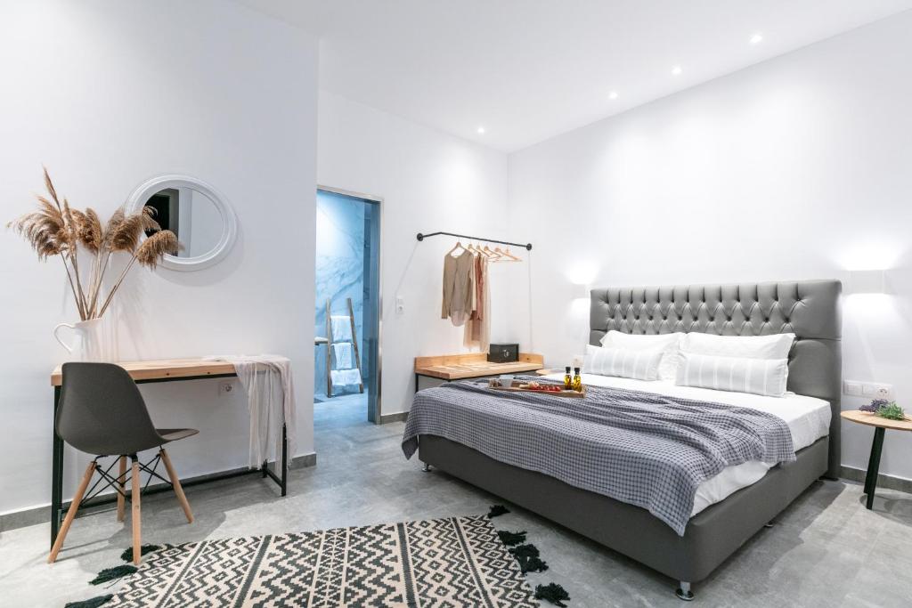 Postel nebo postele na pokoji v ubytování Delight Suites