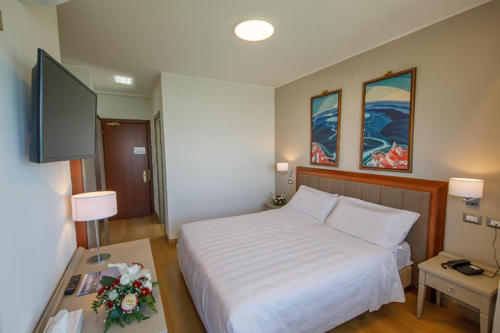 TV a/nebo společenská místnost v ubytování Hotel Lidò