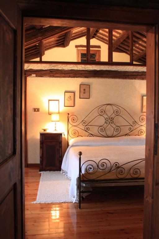 Postel nebo postele na pokoji v ubytování Casa Barnaba-Manin