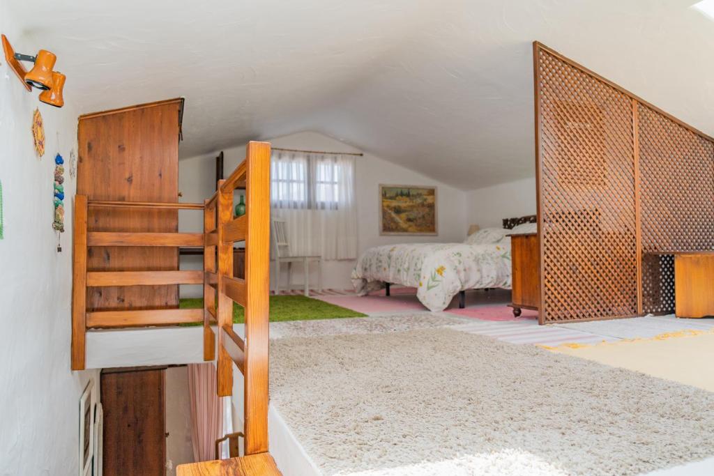 Postel nebo postele na pokoji v ubytování Finca La Fuentecilla