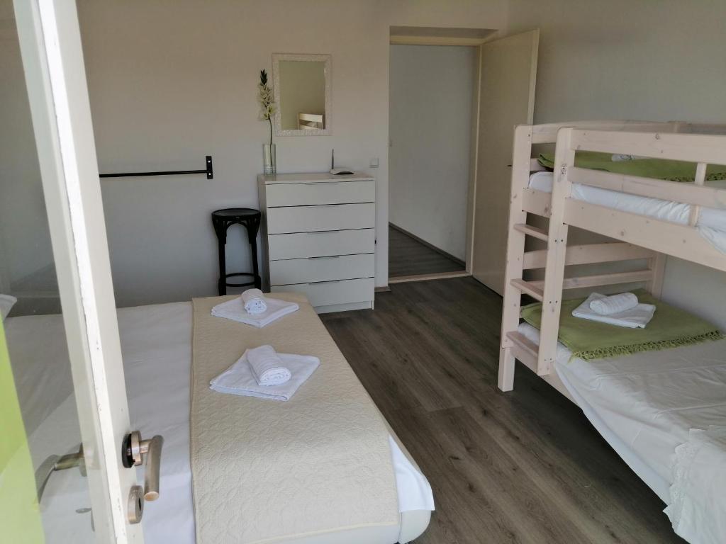 Posteľ alebo postele v izbe v ubytovaní Apartment Roky