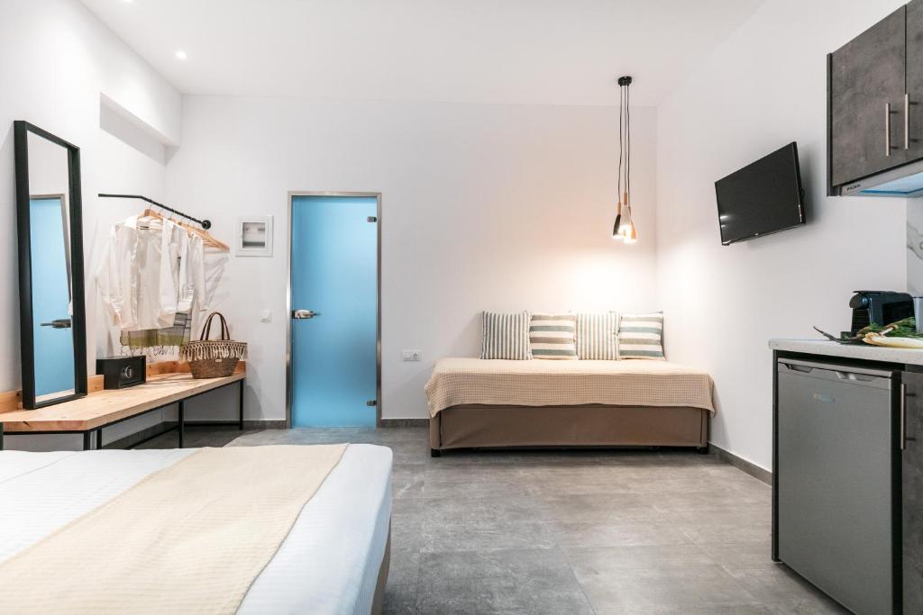 Postel nebo postele na pokoji v ubytování Delight Suites