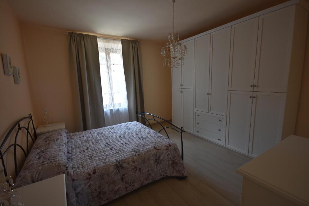 Łóżko lub łóżka w pokoju w obiekcie LA CASA DI CHIANNI La Pieve