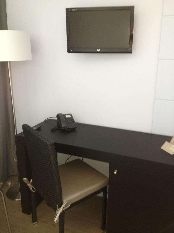 TV a/nebo společenská místnost v ubytování Tag Hotel