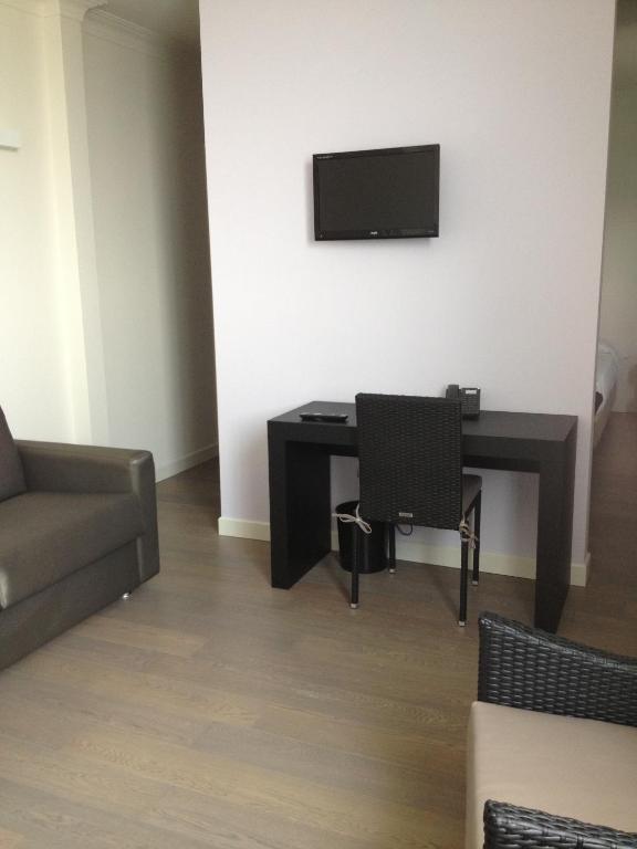 TV a/nebo společenská místnost v ubytování Tag Hotel