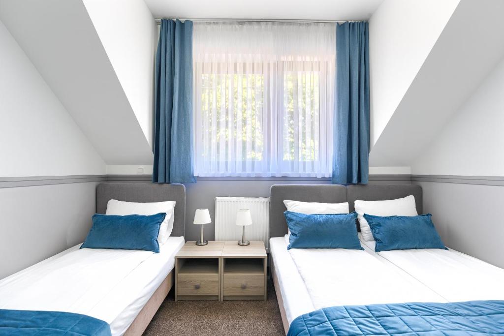 Posteľ alebo postele v izbe v ubytovaní Villa Madre Golf & Family