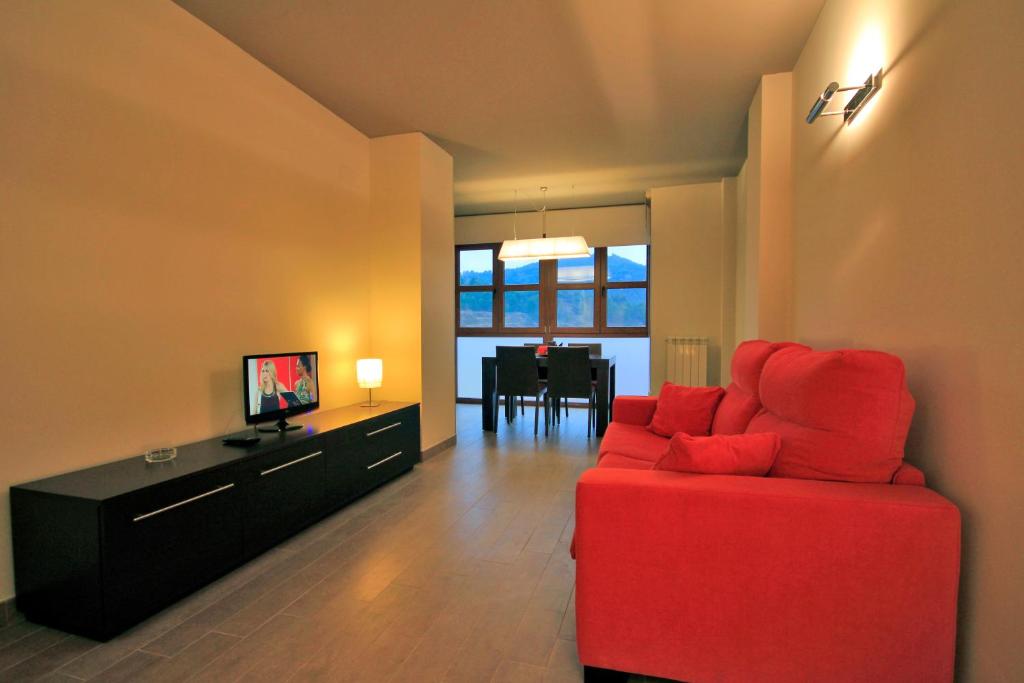 TV a/nebo společenská místnost v ubytování Lagaya Apartaments & Spa