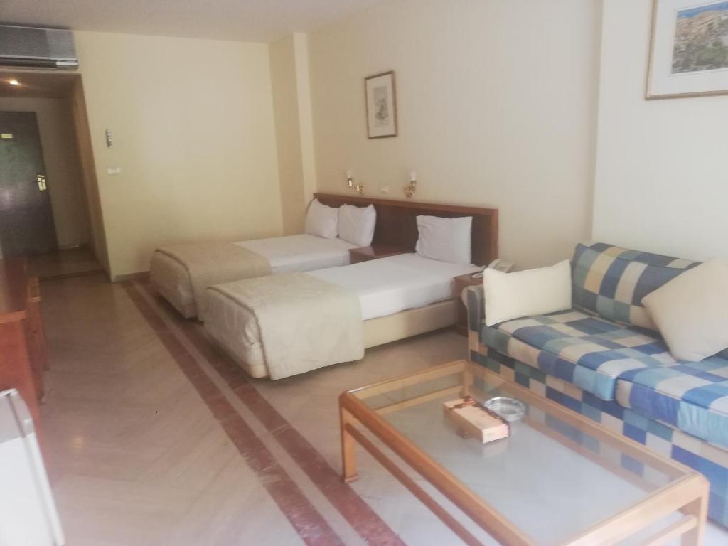 Postel nebo postele na pokoji v ubytování Charles Hotel
