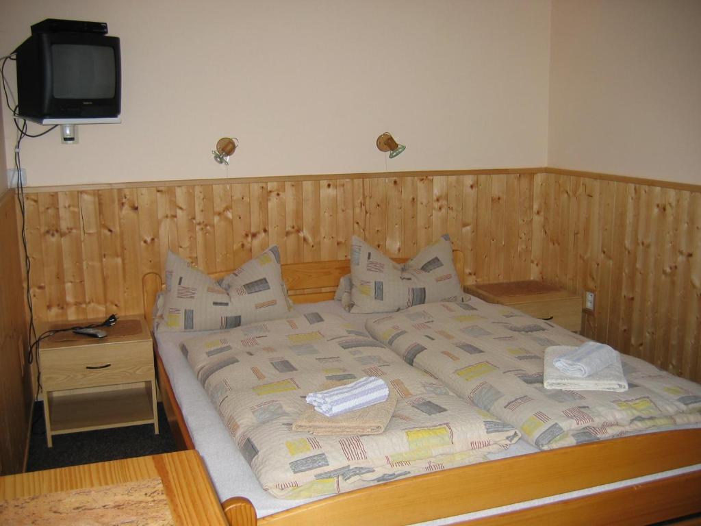 Postel nebo postele na pokoji v ubytování Horský dům