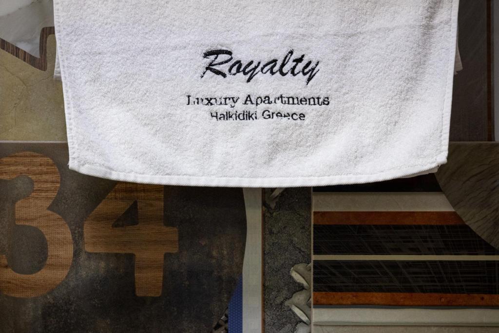 Certifikát, hodnocení, plakát nebo jiný dokument vystavený v ubytování Royalty Suites Seaside