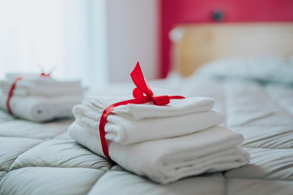 Postel nebo postele na pokoji v ubytování Hotel D'Atri