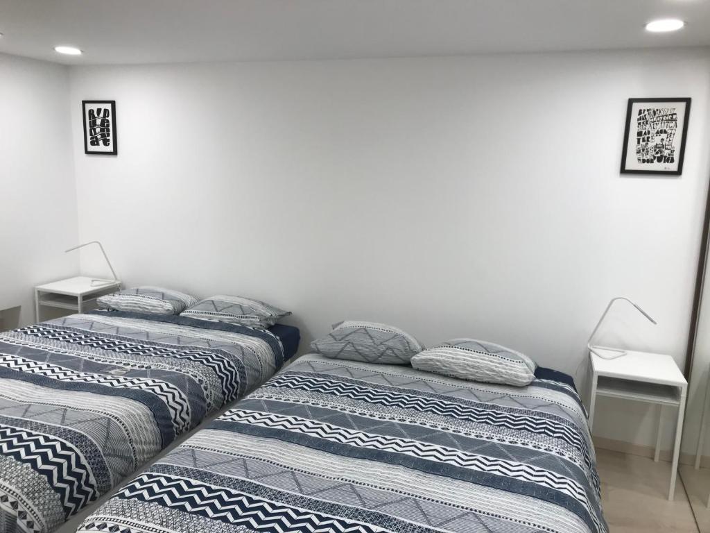 Posteľ alebo postele v izbe v ubytovaní Blaha Art Apartment