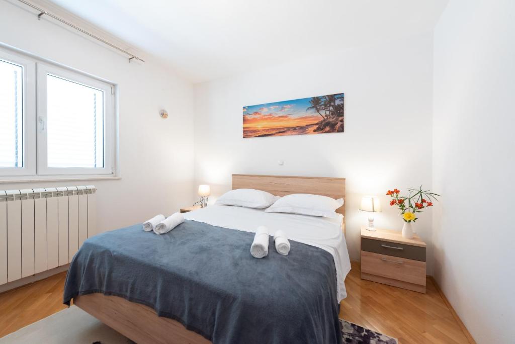 Posteľ alebo postele v izbe v ubytovaní luxury apartment with garden jacuzzi and wellness