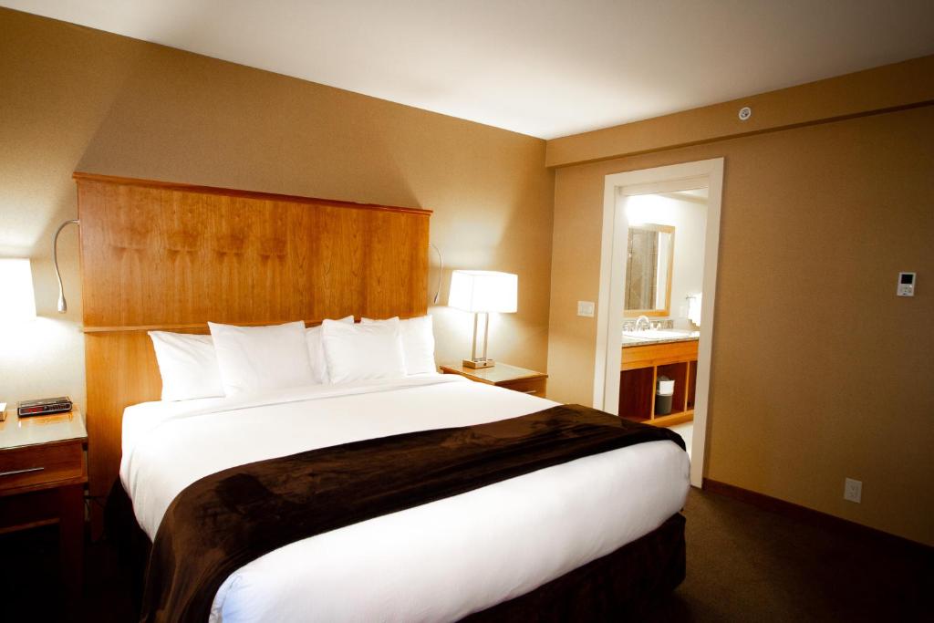Postel nebo postele na pokoji v ubytování Mirabeau Park Hotel