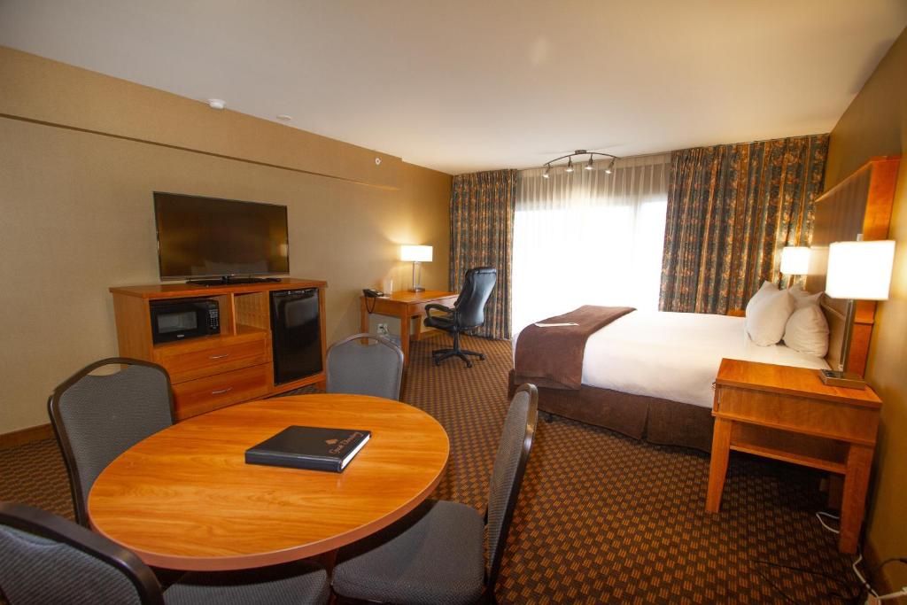 Postel nebo postele na pokoji v ubytování Mirabeau Park Hotel