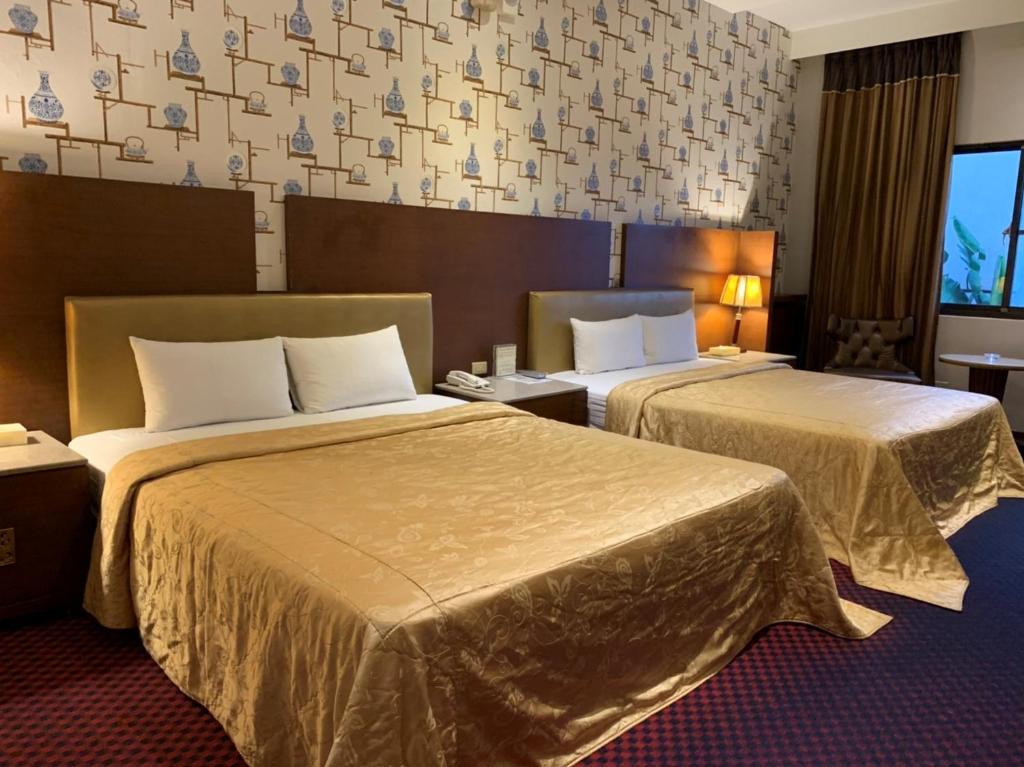 Postel nebo postele na pokoji v ubytování LI-GIN Motel