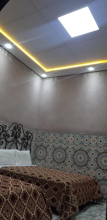 Postel nebo postele na pokoji v ubytování Hotel Wissam