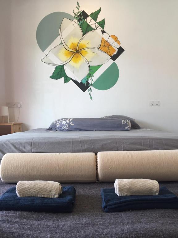 Postel nebo postele na pokoji v ubytování Kawah Padi Garden Villa Langkawi