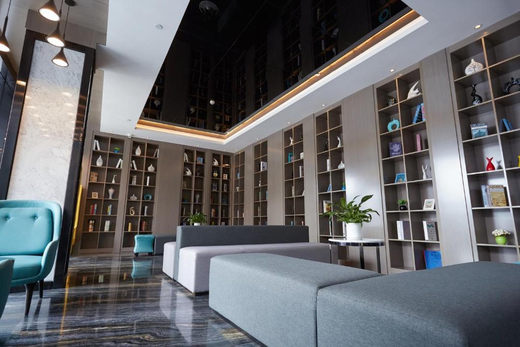 Posezení v ubytování Paco Hotel Guangzhou Baiyun Airport Liantang Metro