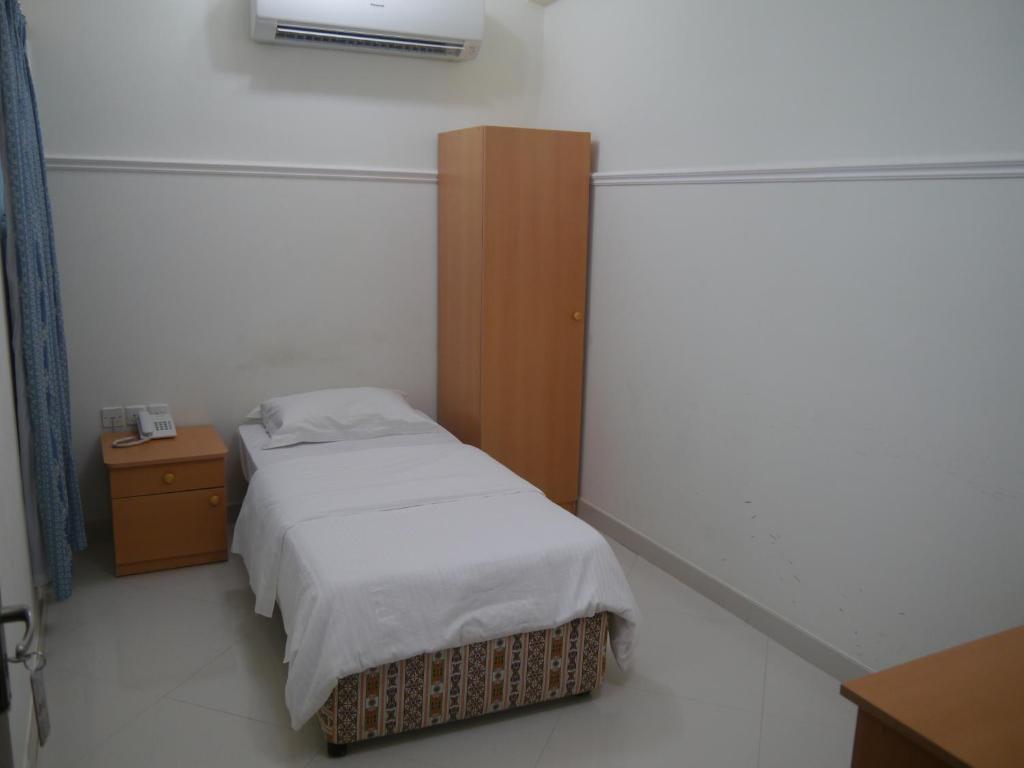 Postel nebo postele na pokoji v ubytování Plaza Hotel