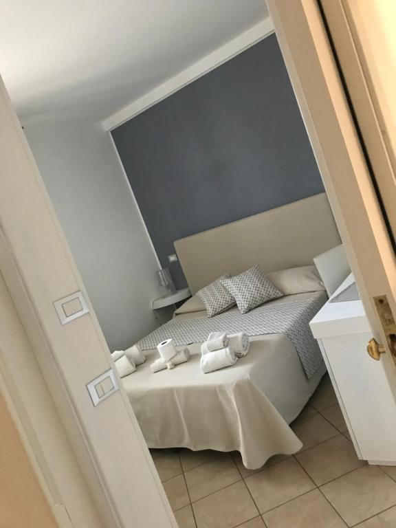 Postel nebo postele na pokoji v ubytování B&B Timpe Bianche