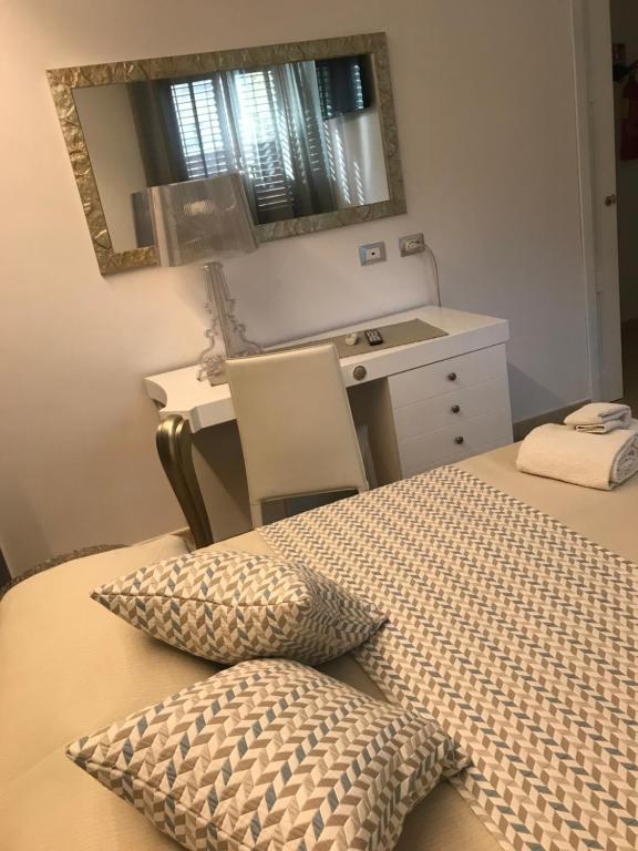 Postel nebo postele na pokoji v ubytování B&B Timpe Bianche