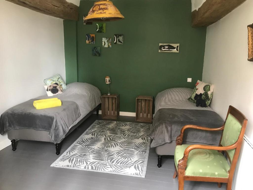 Postel nebo postele na pokoji v ubytování B&B du Cloître