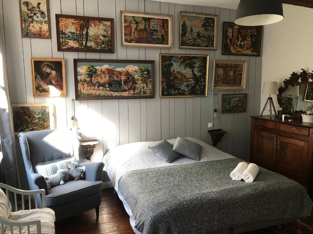 Postel nebo postele na pokoji v ubytování B&B du Cloître