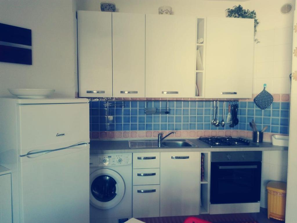 Kuchnia lub aneks kuchenny w obiekcie Appartamento In Residence