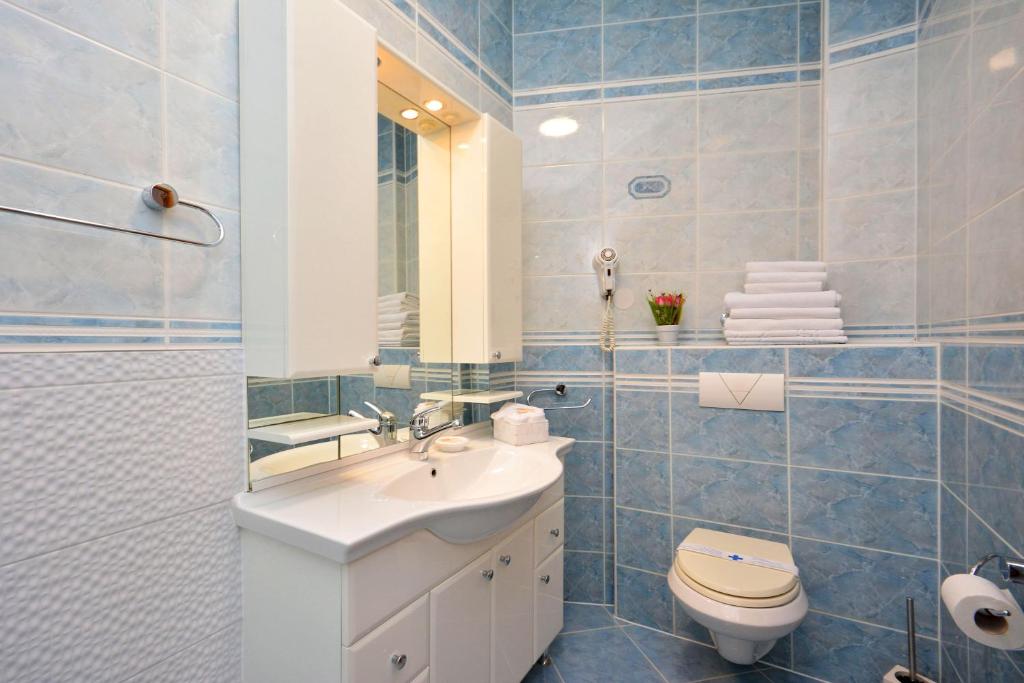 Koupelna v ubytování Hotel Adriana