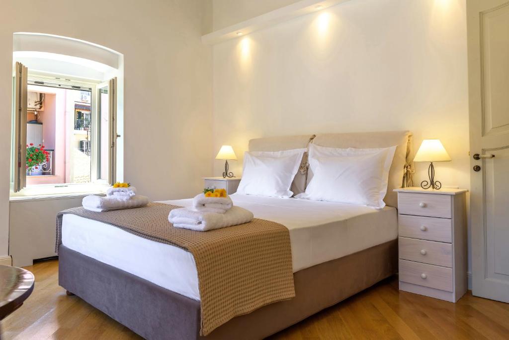 Posteľ alebo postele v izbe v ubytovaní Pithari House