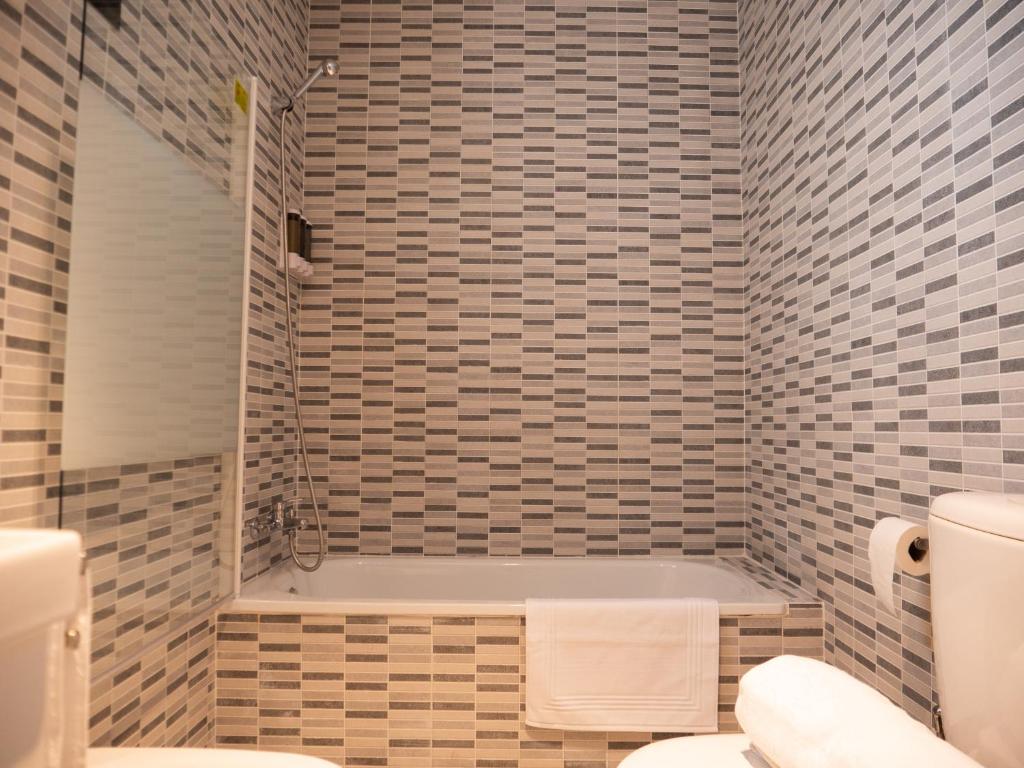 Łazienka w obiekcie Stylish Apartment in the heart of Málaga with Pool