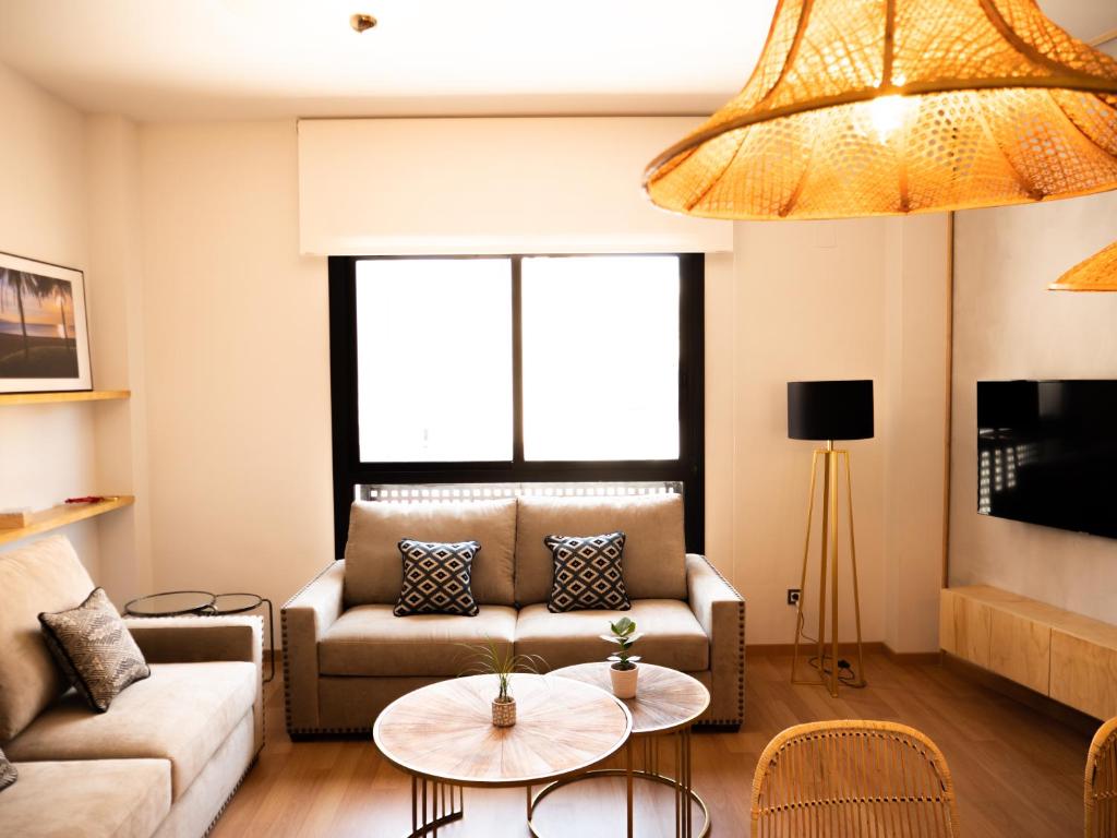 Telewizja i/lub zestaw kina domowego w obiekcie Stylish Apartment in the heart of Málaga with Pool