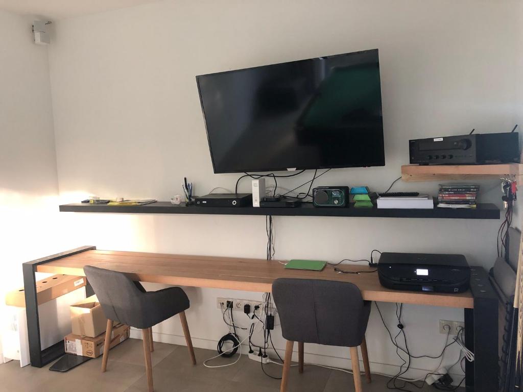 TV a/nebo společenská místnost v ubytování Joff