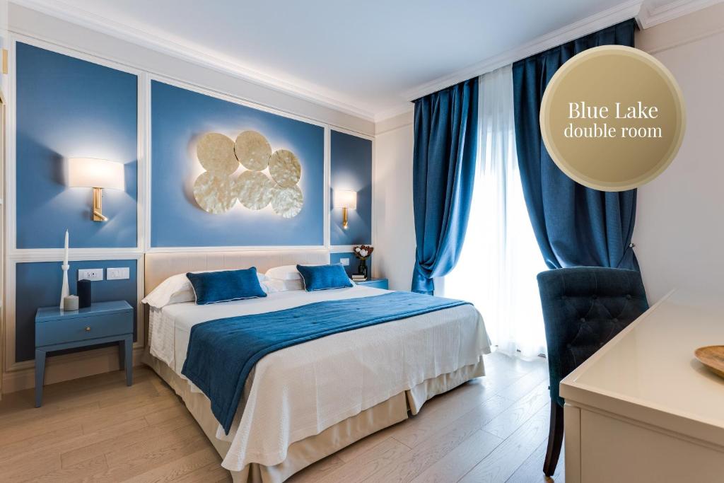 Postel nebo postele na pokoji v ubytování Madrigale Panoramic Lifestyle & Soulful Hotel