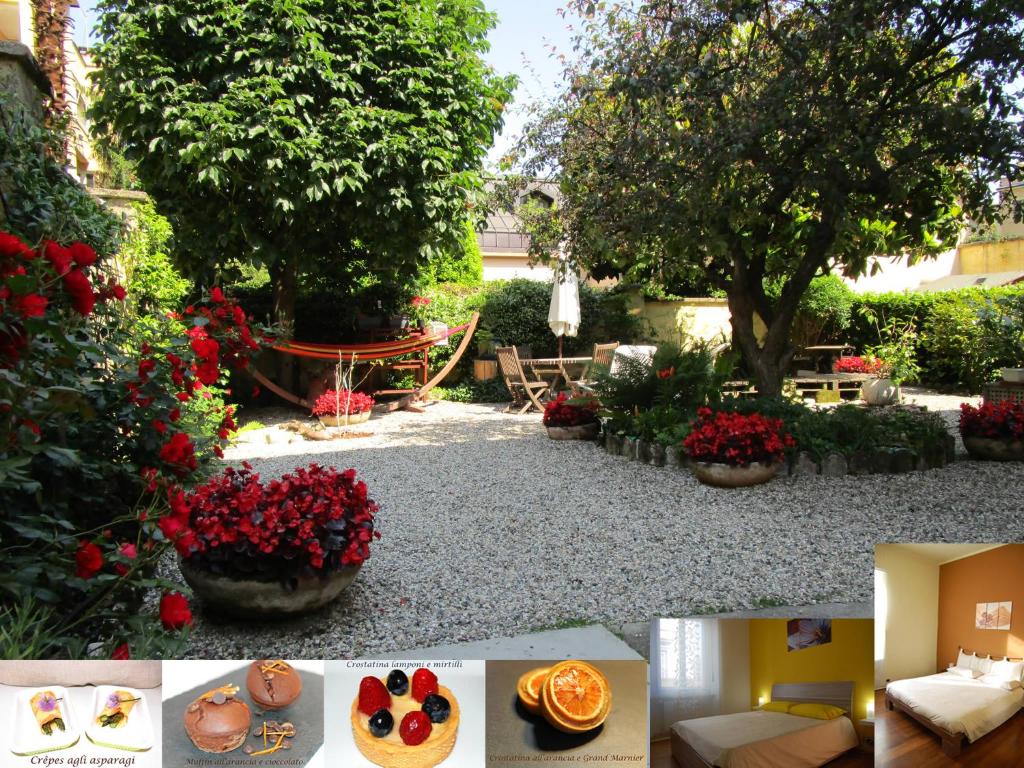 都靈的住宿－Colazione da Augusta - Guesthouse，花园中的照片,包括蛋糕和鲜花