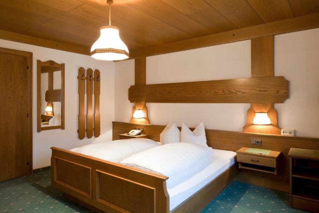Postel nebo postele na pokoji v ubytování Haus Gamberg