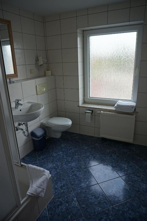 Koupelna v ubytování Hotel am Bahnhof