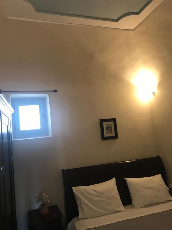 Postel nebo postele na pokoji v ubytování Katsinaros House