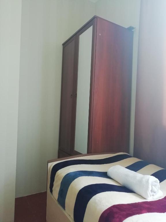 Postel nebo postele na pokoji v ubytování Guest House Carpediem
