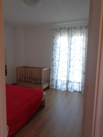 Łóżko lub łóżka w pokoju w obiekcie Casa Luce e Aria