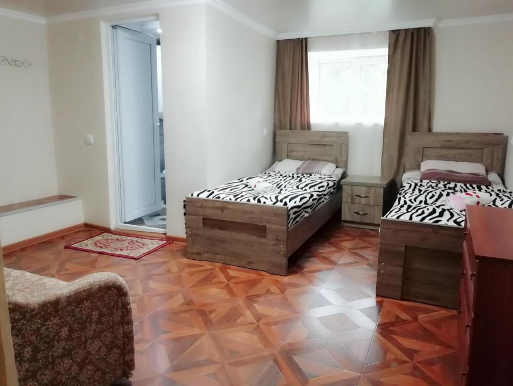 Postel nebo postele na pokoji v ubytování Guest House Carpediem