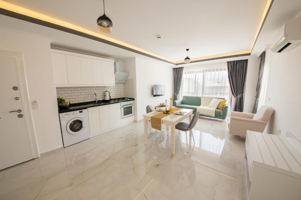 A kitchen or kitchenette at Cedrus Suites