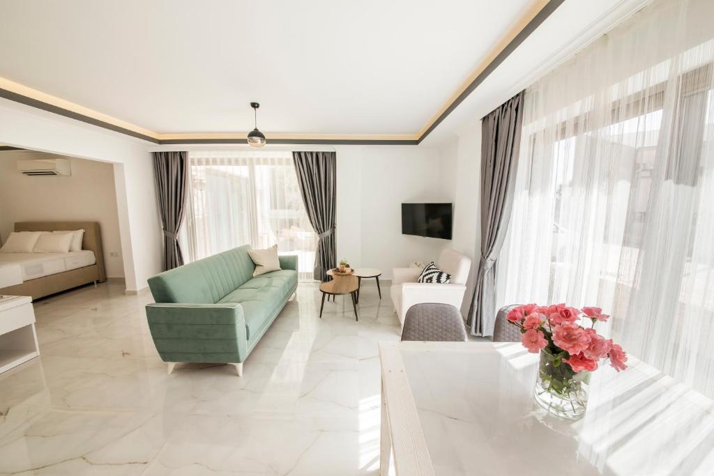 A television and/or entertainment centre at Cedrus Suites