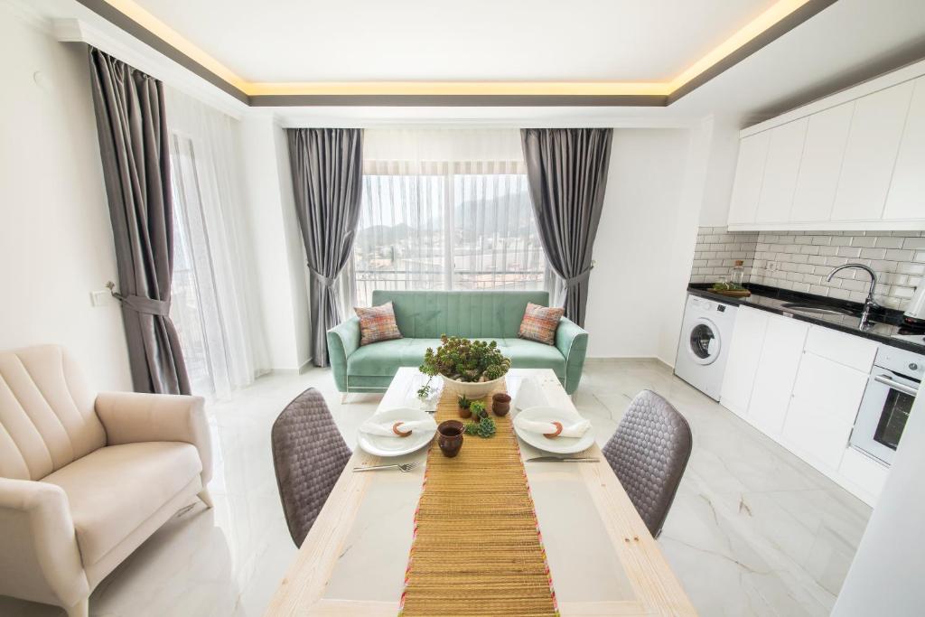 A kitchen or kitchenette at Cedrus Suites