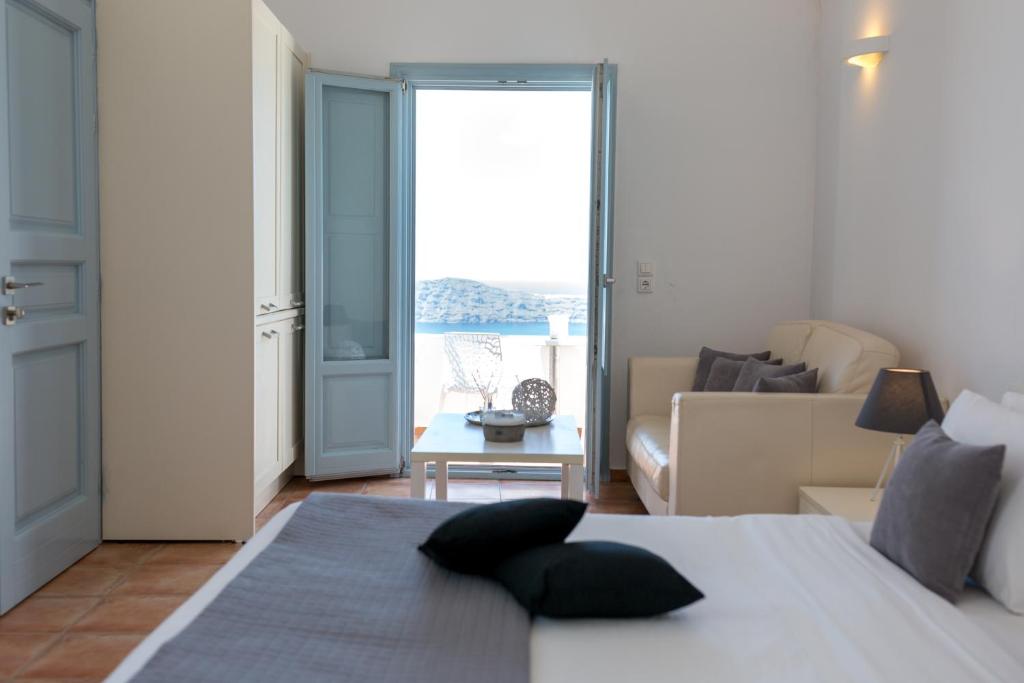 Łóżko lub łóżka w pokoju w obiekcie Dreaming View Suites