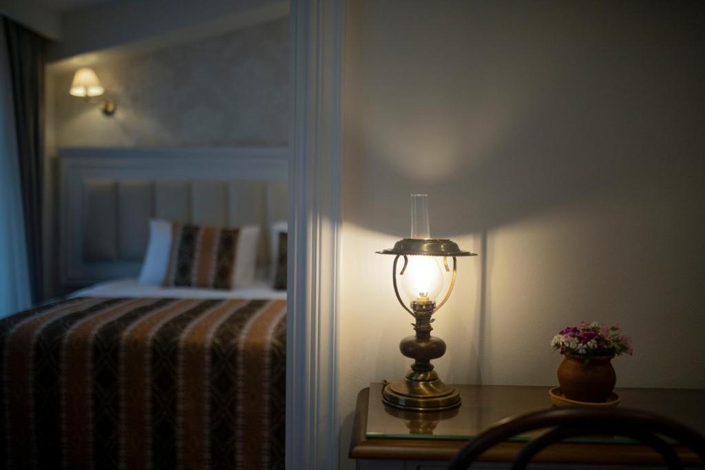 Postel nebo postele na pokoji v ubytování Hotel Passport Tbilisi