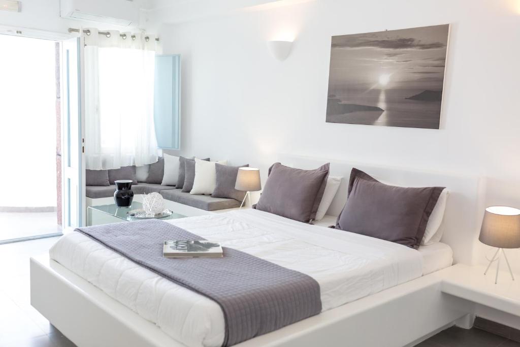 Łóżko lub łóżka w pokoju w obiekcie Dreaming View Suites